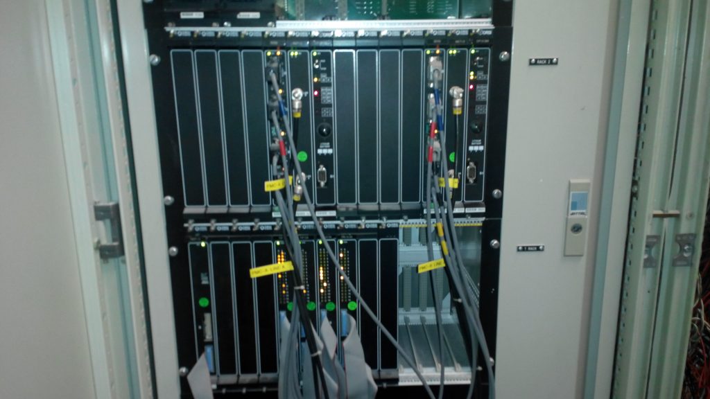 A rack with many wires and some poles