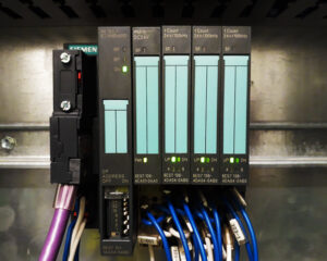 A close up of some wires and a control panel