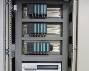 A group of electronic equipment in an enclosure.