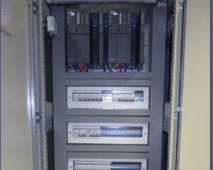 A large metal cabinet with many electrical boxes.