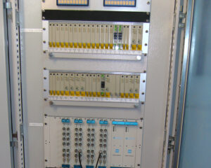A large electrical panel with many wires on it.