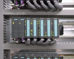 A rack of many different types of computer equipment.