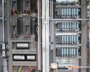 A close up of an electrical panel with wires